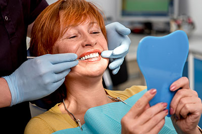 Laurel Bowie Implant and Cosmetic Dentistry | Preventative Program, Extractions and Emergency Treatment