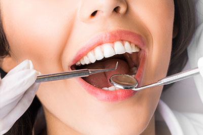 Laurel Bowie Implant and Cosmetic Dentistry | Oral Cancer Screening, Digital Radiography and Ceramic Crowns